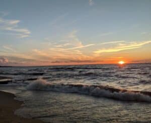 Sunset on Lake Erie from a beach at Presque Isle State Park in Erie, Pa